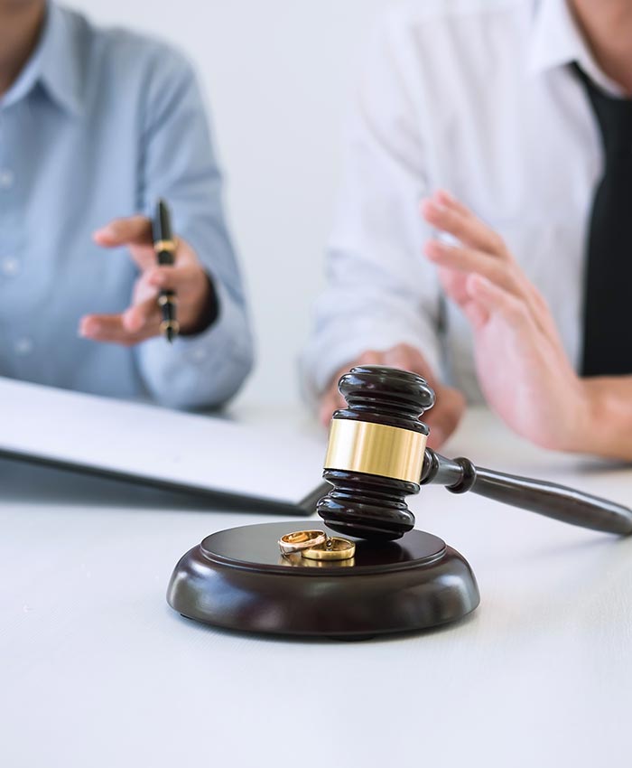 Couple discussing family matter in court hand gestures evidencing a discussion