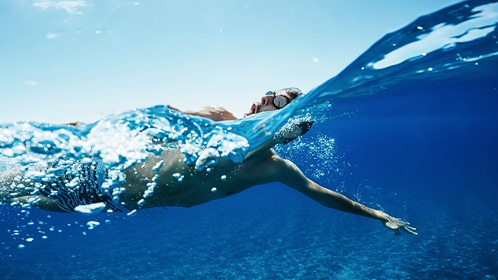 Man swimming at Geo Bay Busselton WA 2023